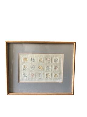 framed embossed lithograph titled "All in a Row" by artist Brooke Morrison.